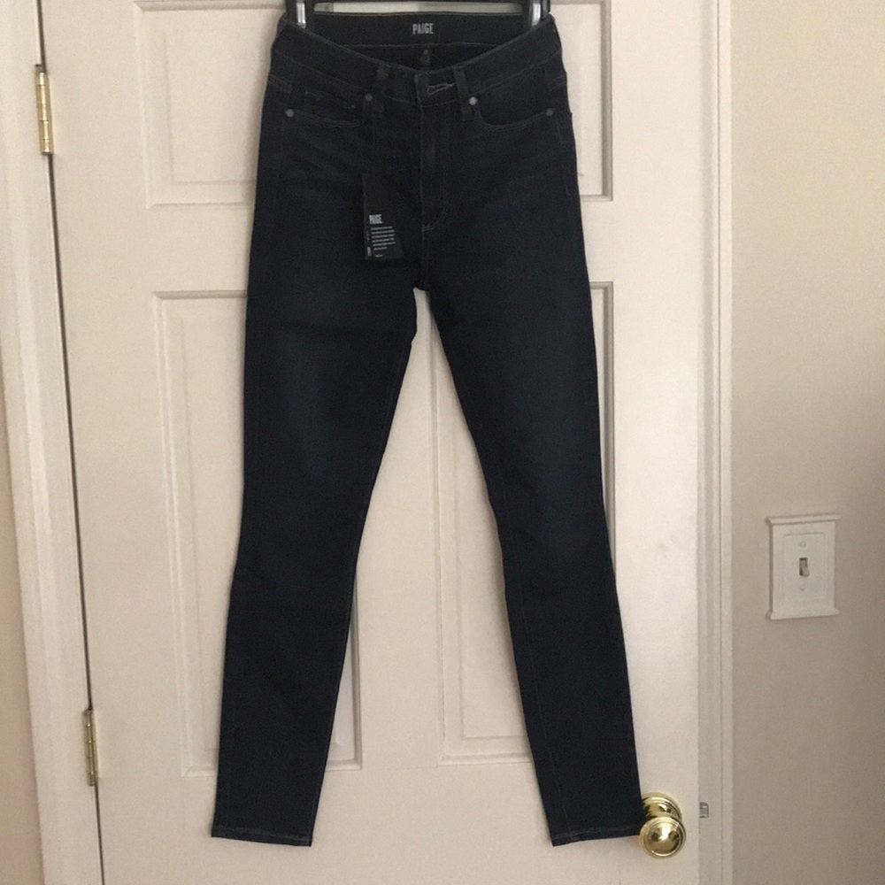 New with tags, dark wash blue jeans size 27 ultra skinny.
